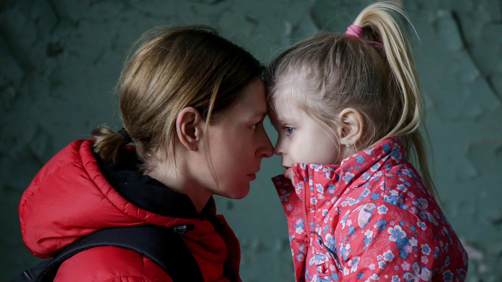 Mother and daughter in basement bomb shelter